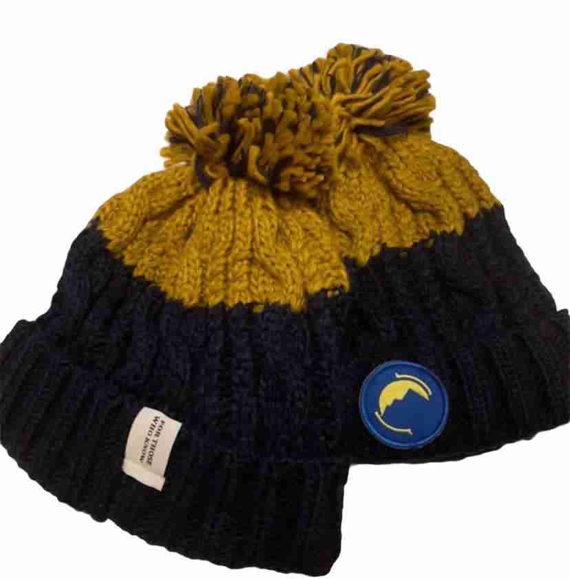 Mustard and navy two-tone bobble hats